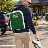 The Caddie Pack backpack walking to the clubhouse | Sunday Swing Club