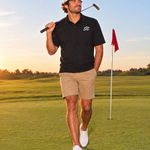 Sunday Swing Polo with the Signature Sunday Cap on the putting green | Sunday Swing Club