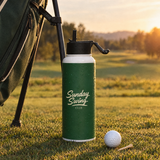 Sunday Swing 32oz water bottle on the tee box next to a golf bag | Sunday Swing Club